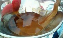 Load image into Gallery viewer, Tucker Maple mixing to make maple cream